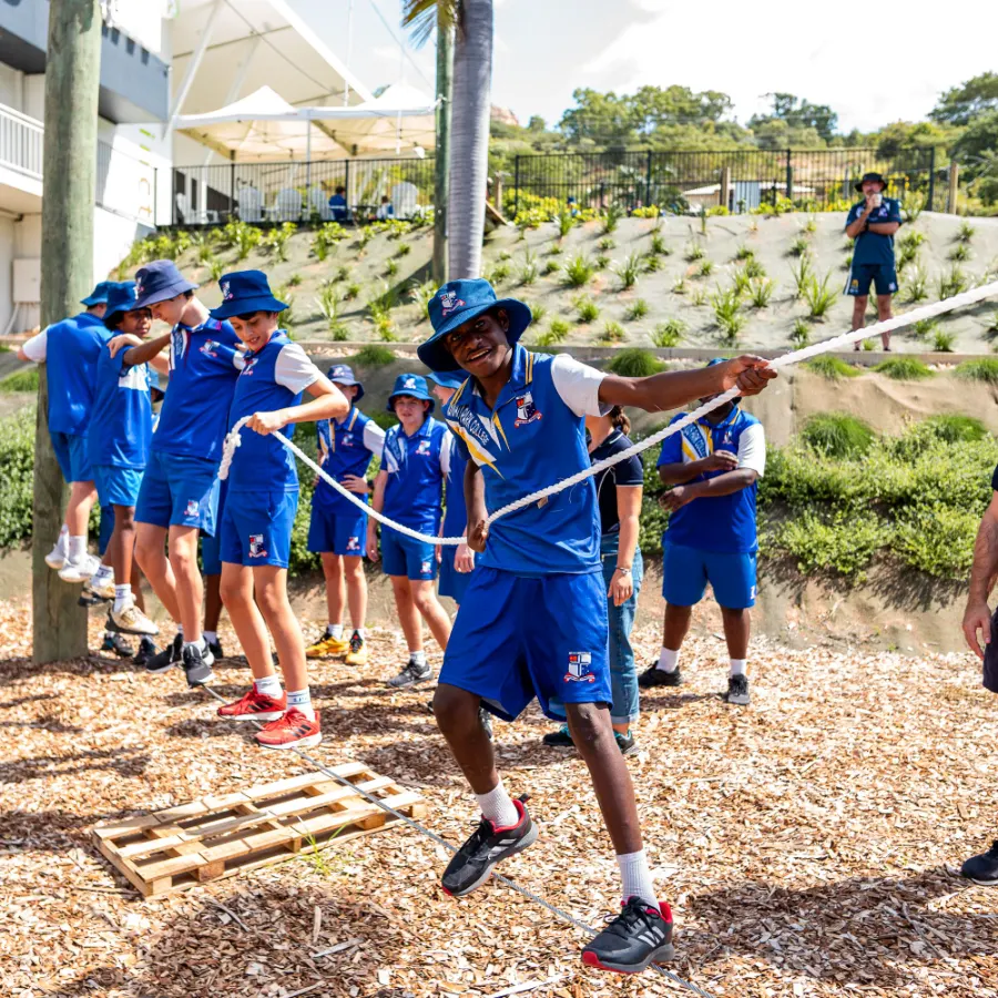 Students on the low ropes course at the YWAM Youth Precinct